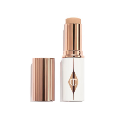 Тональна основа у стіку Charlotte Tilbury Unreal Skin Sheer Glow Tint (4 Fair) 9 g